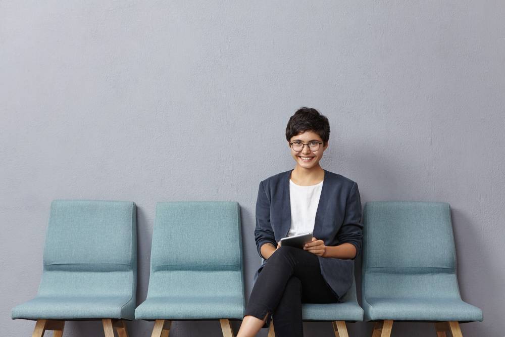 young-woman-sitting-waiting-interview